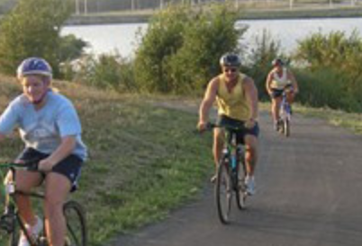 People riding bicycles on a trail